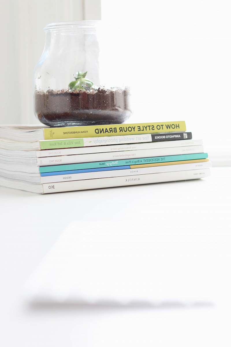 book stack of books on white table newark